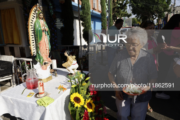 Residents of Santa Maria Tomatlan in the Iztapalapa municipality, Mexico City, live together during the celebration of the Day of the Virgin...