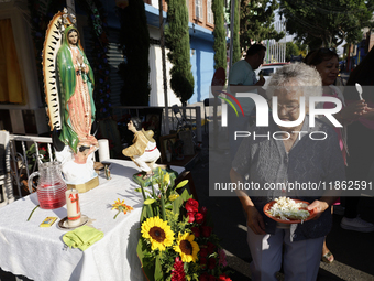 Residents of Santa Maria Tomatlan in the Iztapalapa municipality, Mexico City, live together during the celebration of the Day of the Virgin...