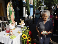 Residents of Santa Maria Tomatlan in the Iztapalapa municipality, Mexico City, live together during the celebration of the Day of the Virgin...