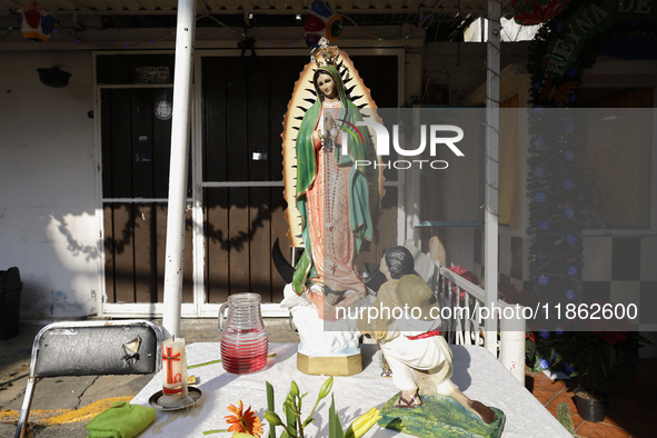 An image of the Virgin of Guadalupe is displayed in Santa Maria Tomatlan in the Iztapalapa municipality, Mexico City, on December 12, 2024,...