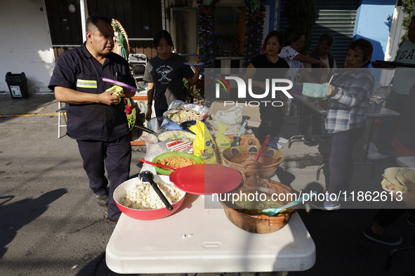 Residents of Santa Maria Tomatlan in the Iztapalapa municipality, Mexico City, live together during the celebration of the Day of the Virgin...