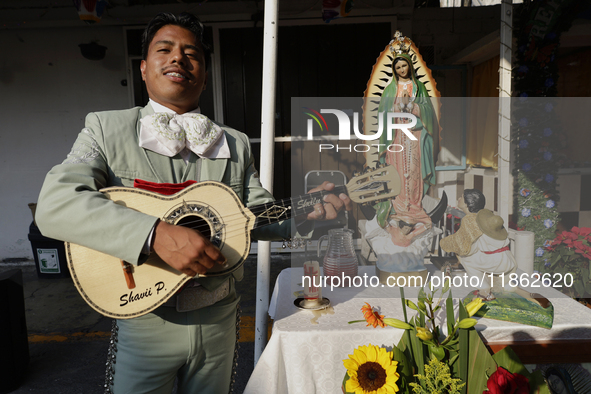 A mariachi sings to the Virgin of Guadalupe in Santa Maria Tomatlan in the Iztapalapa borough, Mexico City, on December 12, 2024, during the...