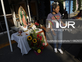 Residents of Santa Maria Tomatlan in the Iztapalapa municipality, Mexico City, live together during the celebration of the Day of the Virgin...