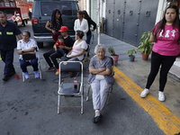 Residents of Santa Maria Tomatlan in the Iztapalapa municipality, Mexico City, live together during the celebration of the Day of the Virgin...