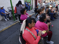 Residents of Santa Maria Tomatlan in the Iztapalapa municipality, Mexico City, live together during the celebration of the Day of the Virgin...