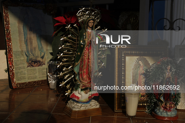 An image of the Virgin of Guadalupe is displayed in Santa Maria Tomatlan in the Iztapalapa municipality, Mexico City, on December 12, 2024,...