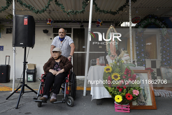 Residents of Santa Maria Tomatlan in the Iztapalapa municipality, Mexico City, live together during the celebration of the Day of the Virgin...