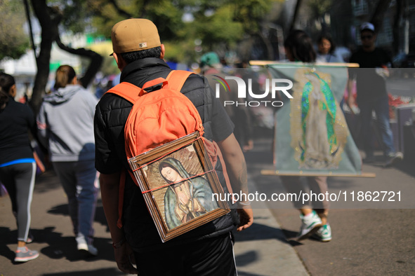 Hundreds of faithful attend the Basilica of Guadalupe to give thanks to the Virgin of Guadalupe for the favors and promises granted as part...