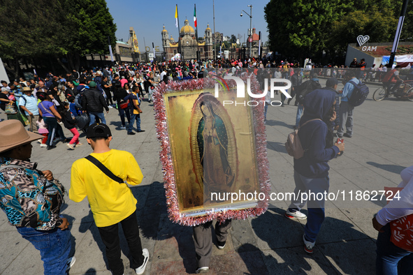 Hundreds of faithful attend the Basilica of Guadalupe to give thanks to the Virgin of Guadalupe for the favors and promises granted as part...