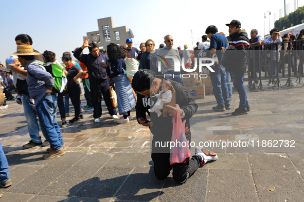 Hundreds of faithful attend the Basilica of Guadalupe to give thanks to the Virgin of Guadalupe for the favors and promises granted as part...