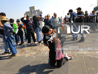 Hundreds of faithful attend the Basilica of Guadalupe to give thanks to the Virgin of Guadalupe for the favors and promises granted as part...