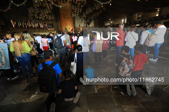 Hundreds of faithful attend the Basilica of Guadalupe to give thanks to the Virgin of Guadalupe for the favors and promises granted as part...