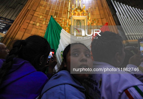 Hundreds of faithful attend the Basilica of Guadalupe to give thanks to the Virgin of Guadalupe for the favors and promises granted as part...