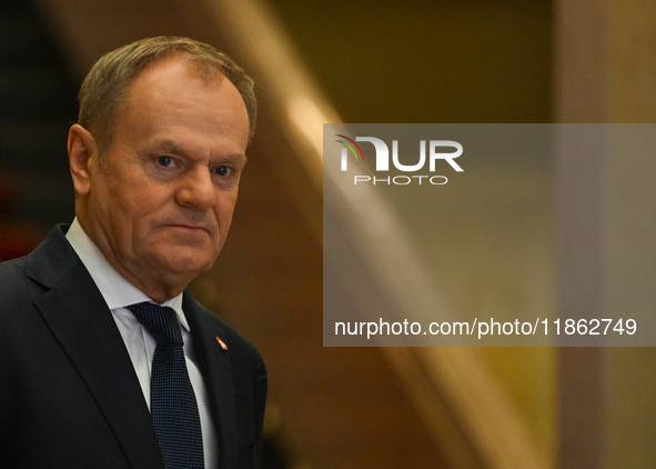 WARSAW, POLAND - DECEMBER 12:
Polish PM Donald Tusk heads to welcome French President Emmanuel Macron at the PM's Office in Warsaw, Poland,...