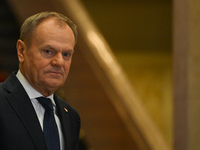 WARSAW, POLAND - DECEMBER 12:
Polish PM Donald Tusk heads to welcome French President Emmanuel Macron at the PM's Office in Warsaw, Poland,...