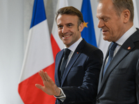 WARSAW, POLAND - DECEMBER 12:
Polish PM Donald Tusk (R) welcomes French President Emmanuel Macron at the PM's Office in Warsaw, Poland, on D...