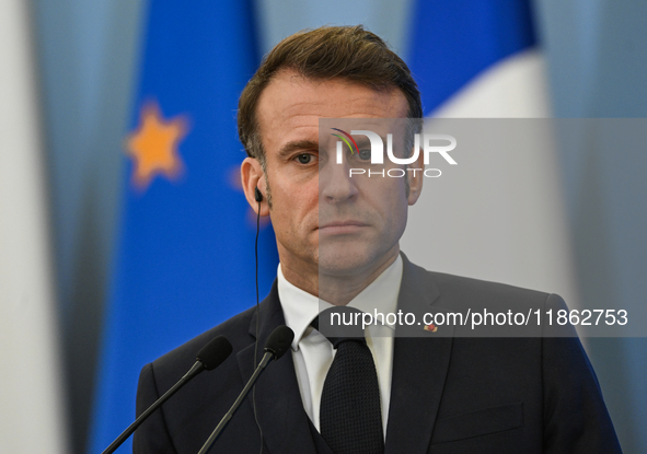 WARSAW, POLAND - DECEMBER 12:
French President Emmanuel Macron delivers remarks during a joint press conference with Polish Prime Minister D...