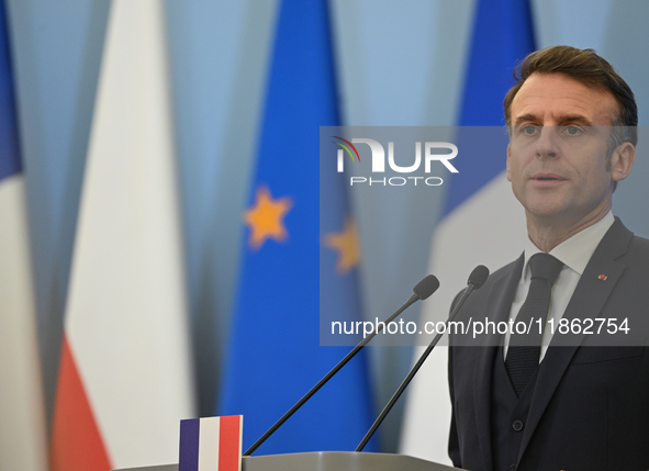 WARSAW, POLAND - DECEMBER 12:
French President Emmanuel Macron delivers remarks during a joint press conference with Polish Prime Minister D...