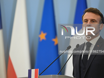 WARSAW, POLAND - DECEMBER 12:
French President Emmanuel Macron delivers remarks during a joint press conference with Polish Prime Minister D...