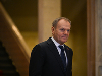 WARSAW, POLAND - DECEMBER 12:
Polish PM Donald Tusk heads to welcome French President Emmanuel Macron at the PM's Office in Warsaw, Poland,...