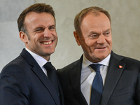 WARSAW, POLAND - DECEMBER 12:
Polish PM Donald Tusk (R) welcomes French President Emmanuel Macron at the PM's Office in Warsaw, Poland, on D...