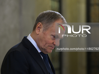 WARSAW, POLAND - DECEMBER 12:
Polish PM Donald Tusk heads to welcome French President Emmanuel Macron at the PM's Office in Warsaw, Poland,...