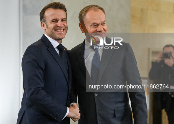 WARSAW, POLAND - DECEMBER 12:
French President Emmanuel Macron delivers remarks during a joint press conference with Polish Prime Minister D...