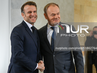 WARSAW, POLAND - DECEMBER 12:
French President Emmanuel Macron delivers remarks during a joint press conference with Polish Prime Minister D...