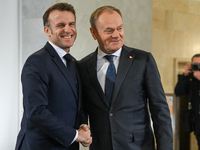 WARSAW, POLAND - DECEMBER 12:
French President Emmanuel Macron delivers remarks during a joint press conference with Polish Prime Minister D...