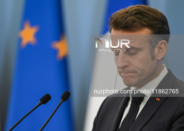 WARSAW, POLAND - DECEMBER 12:
French President Emmanuel Macron delivers remarks during a joint press conference with Polish Prime Minister D...