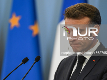 WARSAW, POLAND - DECEMBER 12:
French President Emmanuel Macron delivers remarks during a joint press conference with Polish Prime Minister D...