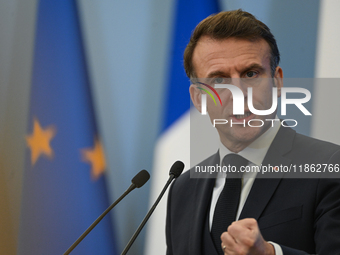 WARSAW, POLAND - DECEMBER 12:
French President Emmanuel Macron delivers remarks during a joint press conference with Polish Prime Minister D...