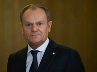 WARSAW, POLAND - DECEMBER 12:
Polish PM Donald Tusk heads to welcome French President Emmanuel Macron at the PM's Office in Warsaw, Poland,...