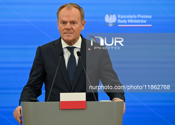 WARSAW, POLAND - DECEMBER 12:
Polish Prime Minister Donald Tusk delivers remarks during a joint press conference with French President Emman...