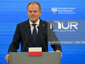 WARSAW, POLAND - DECEMBER 12:
Polish Prime Minister Donald Tusk delivers remarks during a joint press conference with French President Emman...