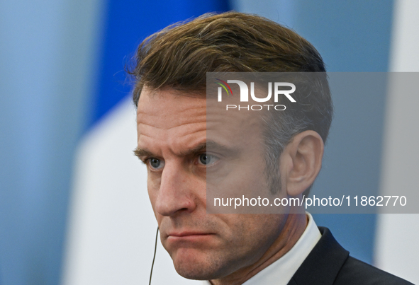 WARSAW, POLAND - DECEMBER 12:
French President Emmanuel Macron delivers remarks during a joint press conference with Polish Prime Minister D...