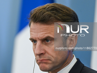 WARSAW, POLAND - DECEMBER 12:
French President Emmanuel Macron delivers remarks during a joint press conference with Polish Prime Minister D...