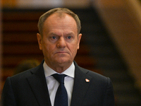 WARSAW, POLAND - DECEMBER 12:
Polish PM Donald Tusk heads to welcome French President Emmanuel Macron at the PM's Office in Warsaw, Poland,...