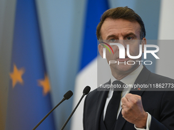 WARSAW, POLAND - DECEMBER 12:
French President Emmanuel Macron delivers remarks during a joint press conference with Polish Prime Minister D...