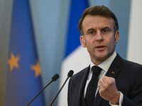 WARSAW, POLAND - DECEMBER 12:
French President Emmanuel Macron delivers remarks during a joint press conference with Polish Prime Minister D...