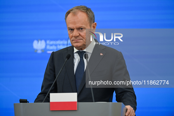 WARSAW, POLAND - DECEMBER 12:
Polish Prime Minister Donald Tusk delivers remarks during a joint press conference with French President Emman...