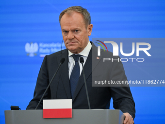 WARSAW, POLAND - DECEMBER 12:
Polish Prime Minister Donald Tusk delivers remarks during a joint press conference with French President Emman...