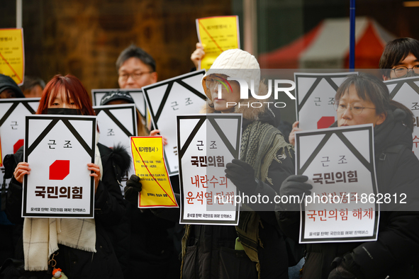 Around 30 members of the Korean Confederation of Trade Unions (KCTU) and other civil society groups hold a press conference in front of the...