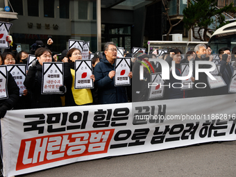 Around 30 members of the Korean Confederation of Trade Unions (KCTU) and other civil society groups hold a press conference in front of the...