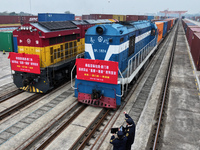 Two rail-sea freight trains leave Nanchang International Dry Port under the supervision of Ganjiang New District customs in Nanchang, East C...