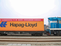 Two rail-sea freight trains leave Nanchang International Land Port Freight Yard in Nanchang, Jiangxi province, China, on December 12, 2024....