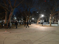 The NYPD evidence collection team gathers evidence and marks shell casings at the scene where two people are shot at Lafayette Gardens NYCHA...