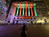 The Fearless Girl statue stands tall in front of the New York Stock Exchange on Broad Street in New York, N.Y., on December 12, 2024. (