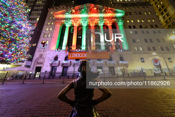 The Fearless Girl statue stands tall in front of the New York Stock Exchange on Broad Street in New York, N.Y., on December 12, 2024. 