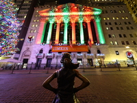 The Fearless Girl statue stands tall in front of the New York Stock Exchange on Broad Street in New York, N.Y., on December 12, 2024. (